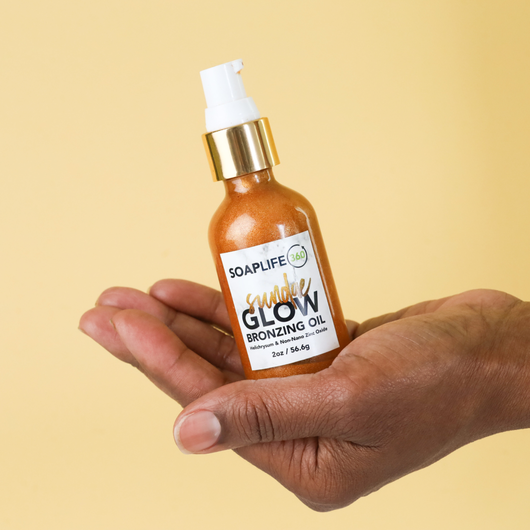 A shimmer oil infused with extracts, zinc oxide for sun protection, and scented with Helichrysum Essential oils