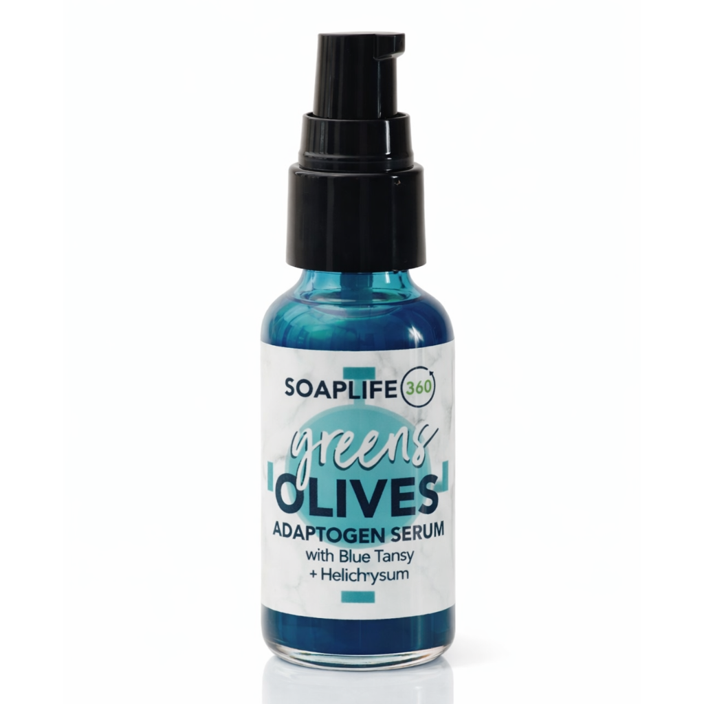 Greens + Olives serum bottle on a white background