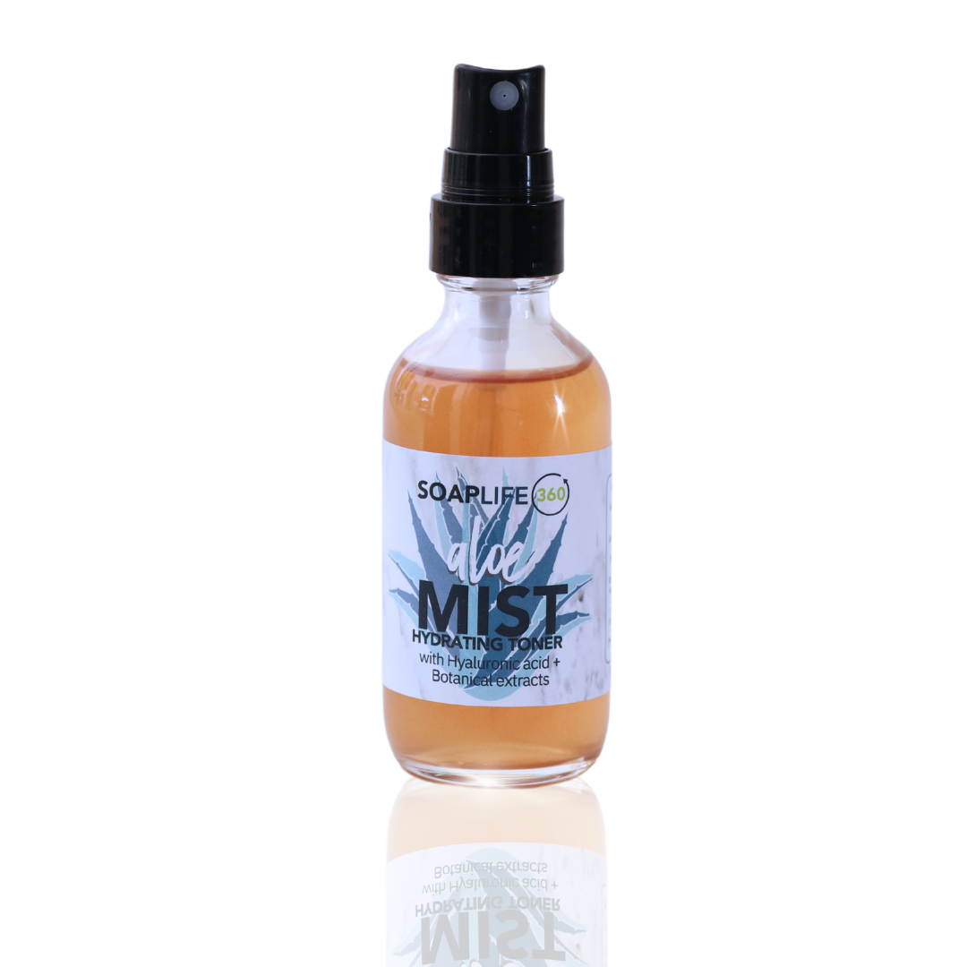 A spray bottle of Aloe Mist Hydrating Toner from Soap & Water, with a clear liquid visible through the bottle.