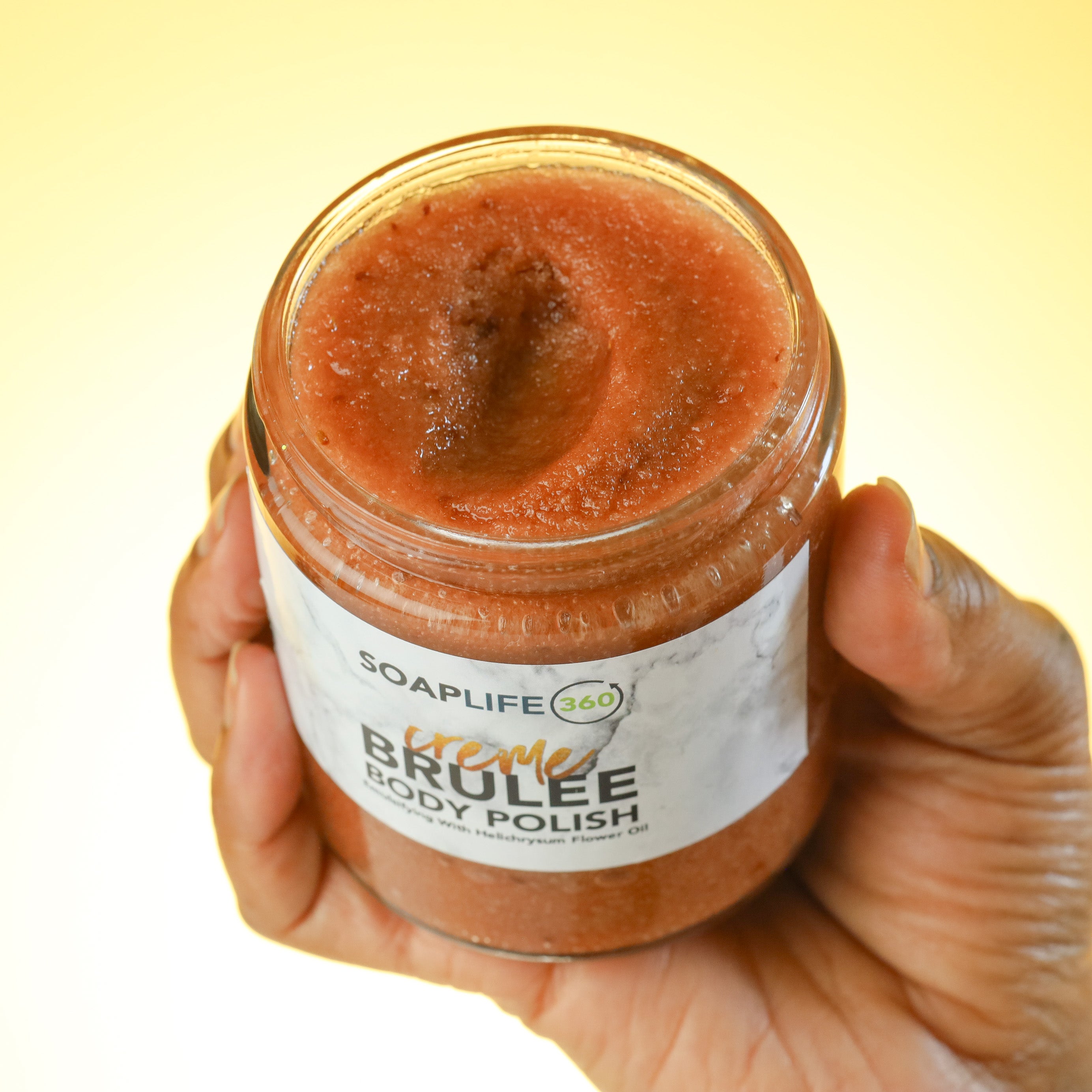 A sugar scrub and shimmery glow oil set