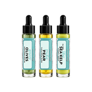 Three glass dropper bottles of Soaplife (GO) facial oils and exfoliators lined up on a white background: Olives, Pear, and Sea Kelp.