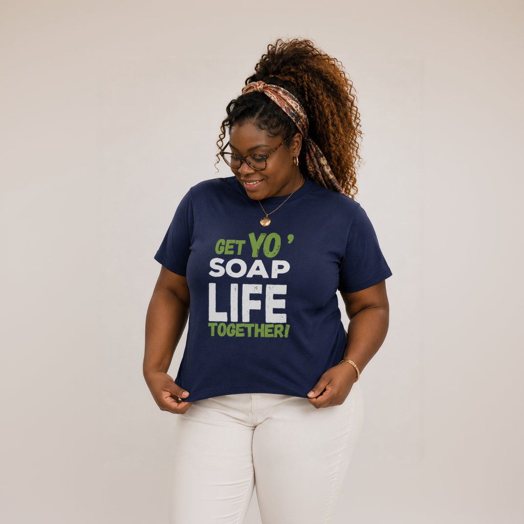 Woman wearing a navy blue t-shirt with Get yo' Soaplife together on it