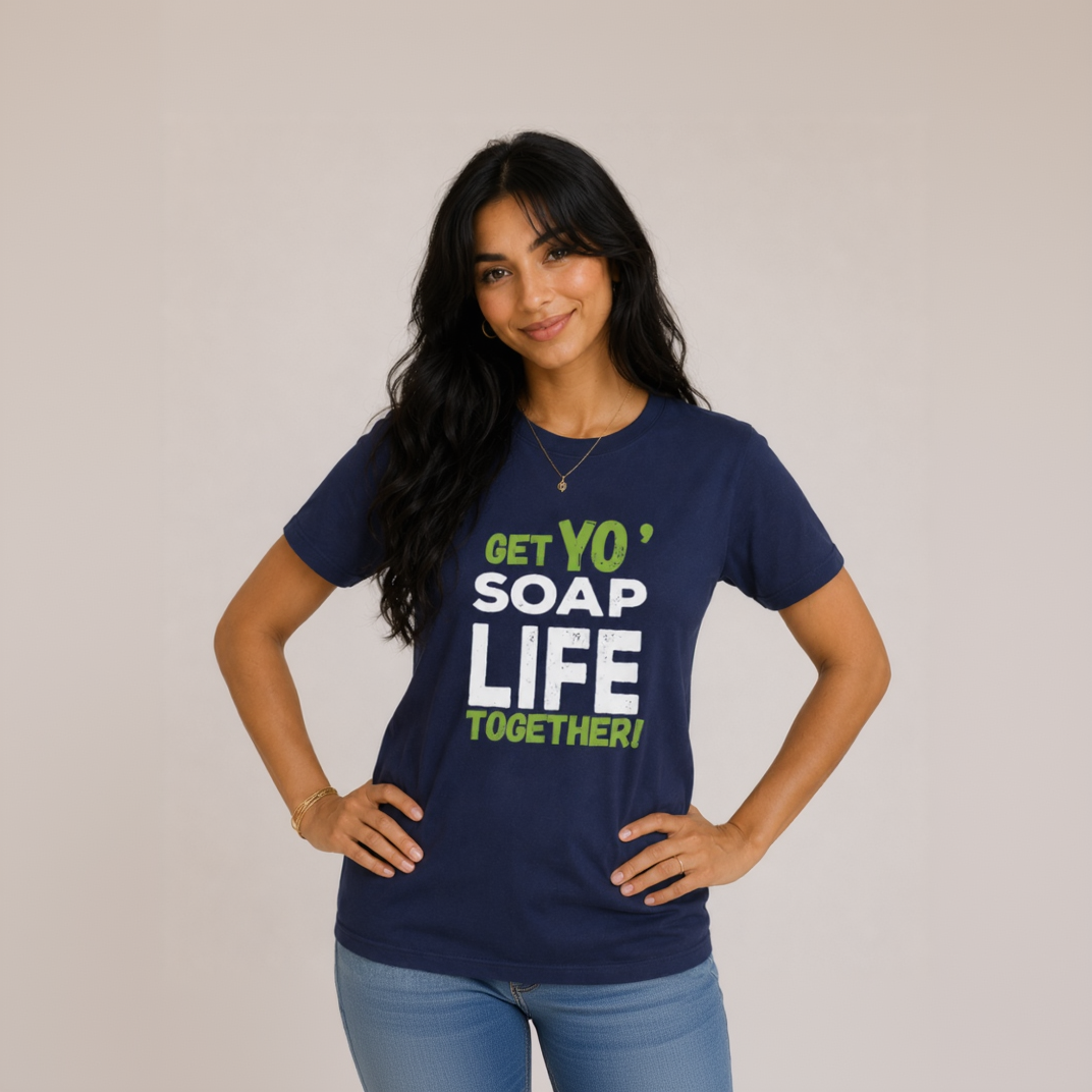 Woman wearing a navy blue t-shirt with colorful text on a plain background